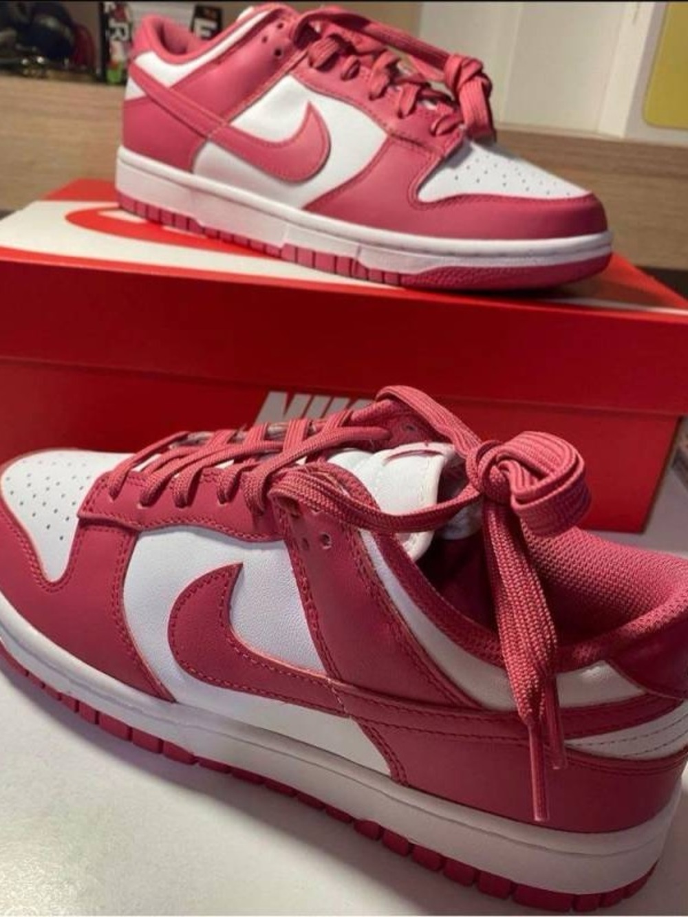 Nike Dunk Low Sneakers in White & Pink